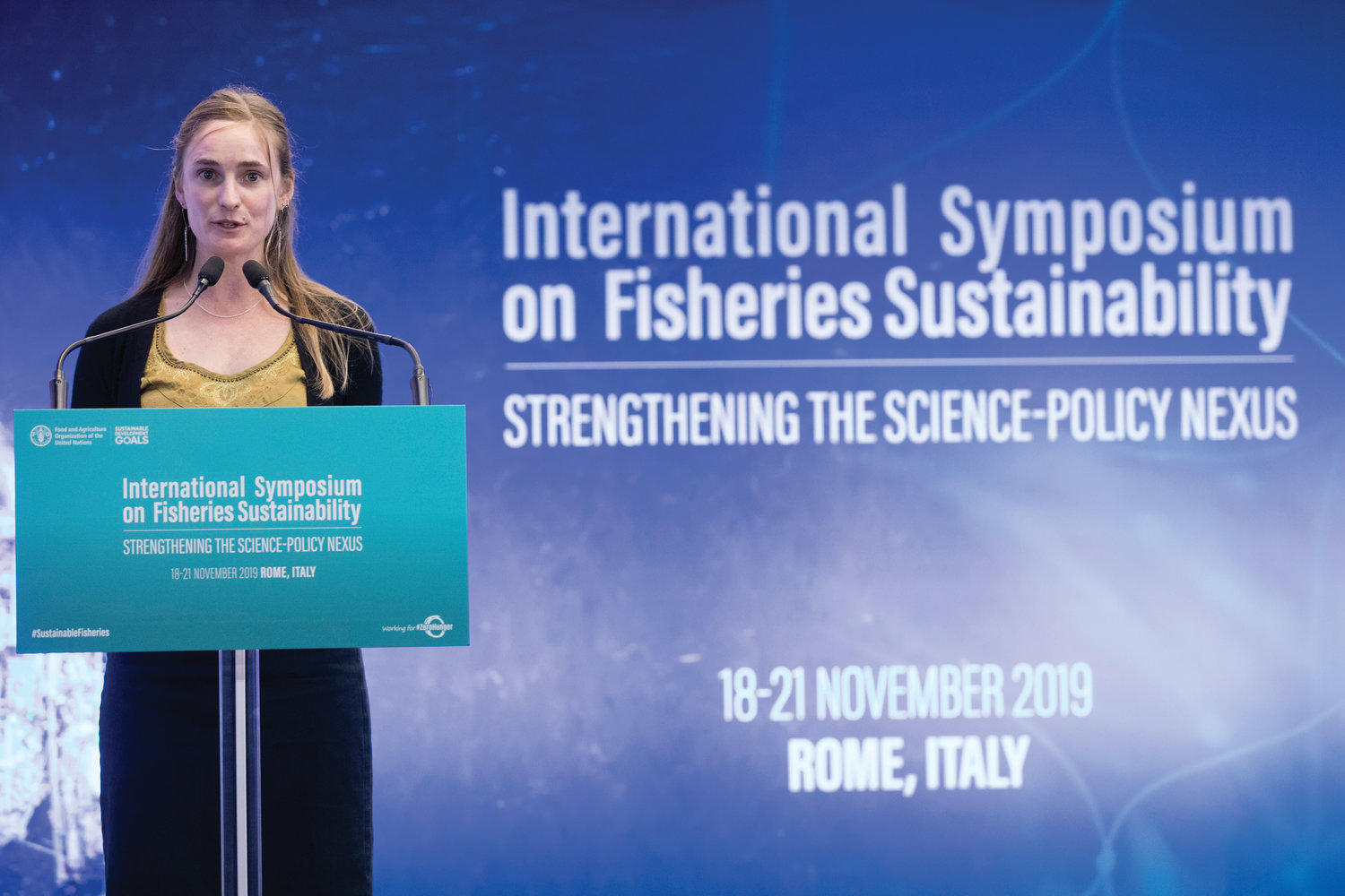 Above: At the podium of the United Nations’ Food and Agricultural Organization (FAO) symposium on sustainable fisheries in Rome, Nov. 18, Port Townsend commercial fisher Rebecca Argo encouraged policies that favor owner-operators and indigenous fishers in the Alaska salmon fishery.